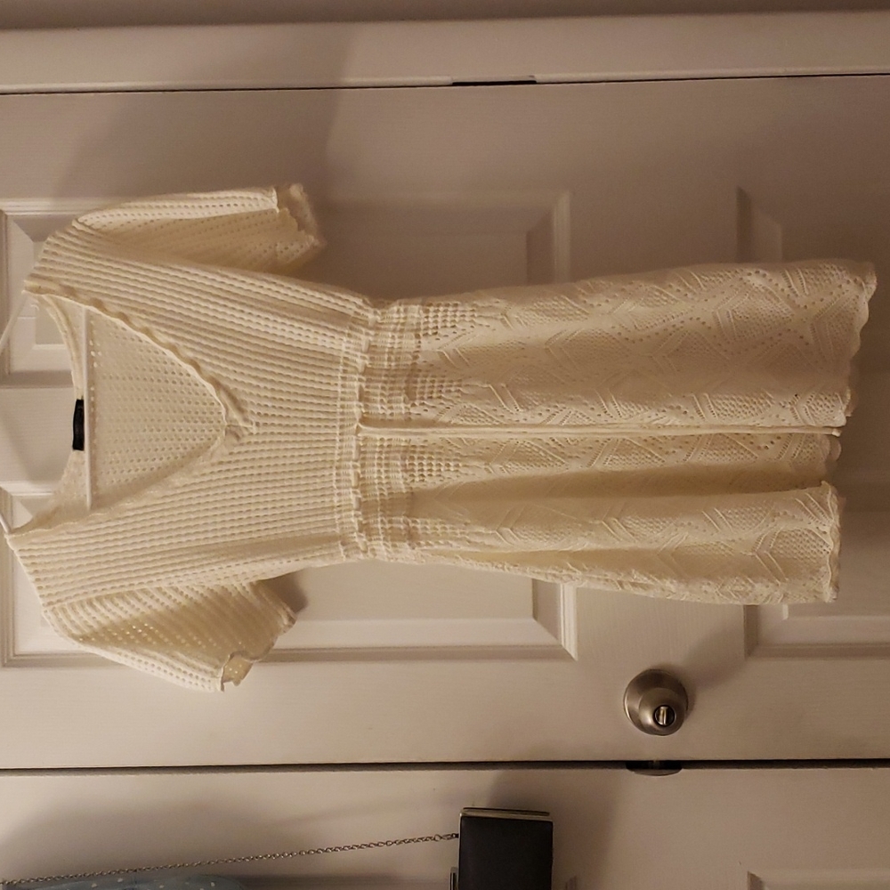 A cute white pool exit
